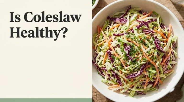 Bowl of fresh green and red cabbage coleslaw with carrots, with text overlay reading Is Coleslaw Healthy