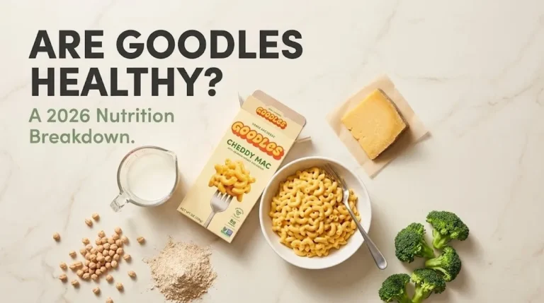 Goodles mac and cheese box and bowl with chickpeas, broccoli, and cheddar on marble. Headline reads Are Goodles Healthy