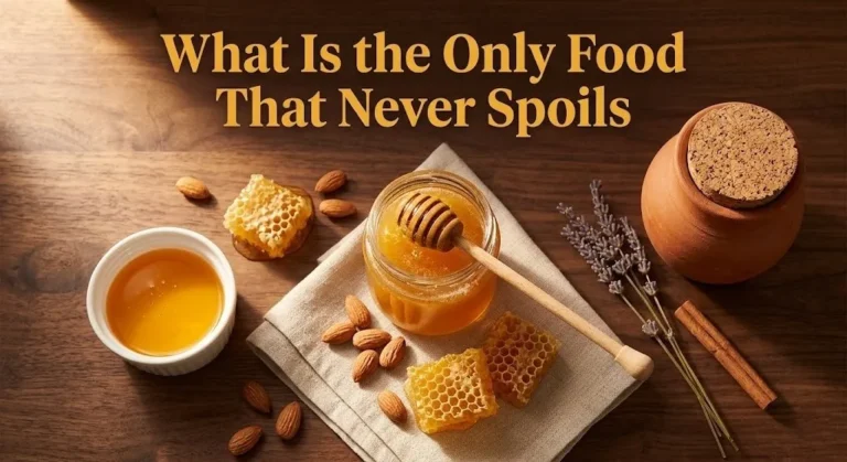 Overhead photo of crystallized and liquid honey with honeycomb and the headline What Is the Only Food That Never Spoils as a hero banner for a food science guide.