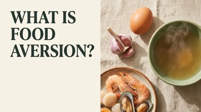 What is food aversion hero image showing common trigger foods including egg, garlic, and seafood on cream background